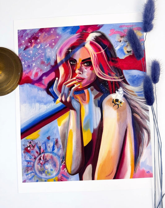 A picture of a print of a woman and a bee Against an abstract background