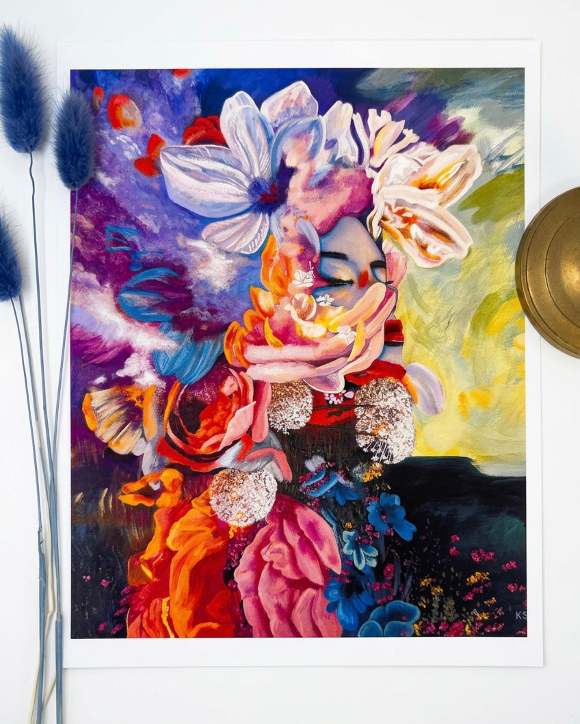 A picture of a print featuring a face surrounded by clouds and flowers. Colourful and vibrant