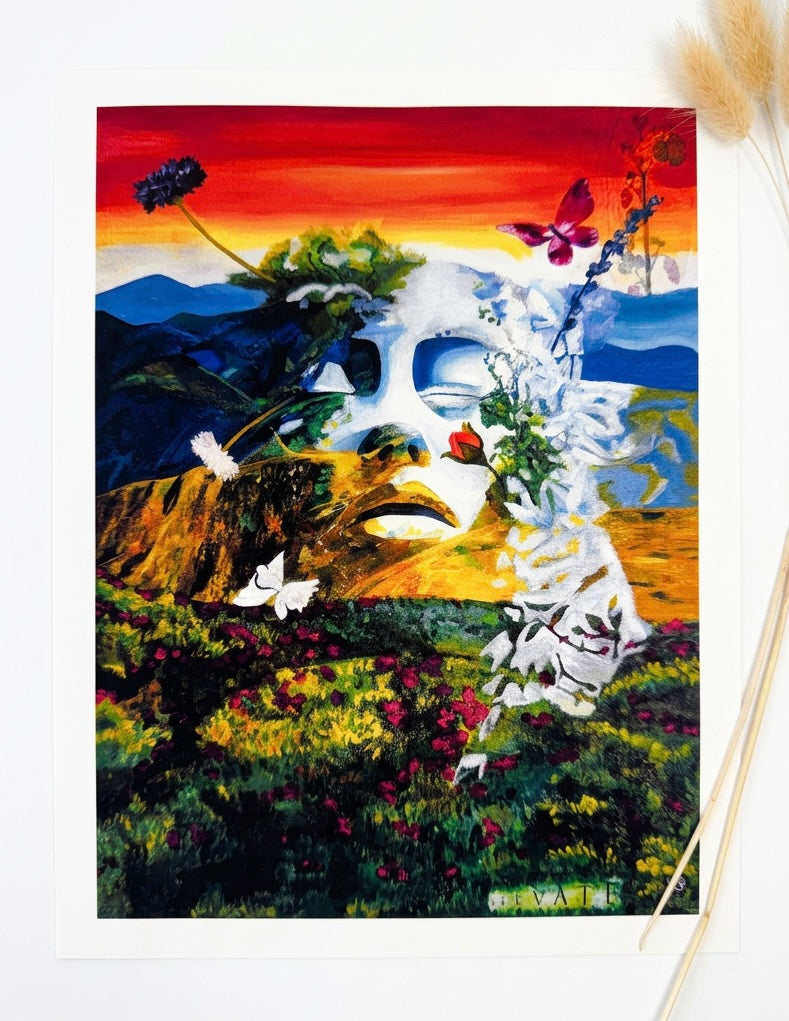 A print of a face elevating from a landscape with flowers. Blue  orange yellow and white