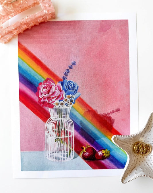A print of a vase of flowers, strawberries, and a rainbow
