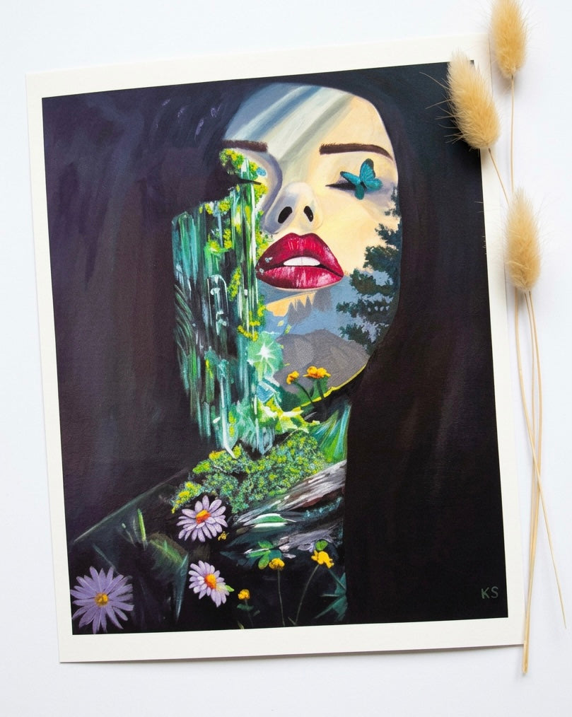 A print of a woman with daisy flowers and emeralds