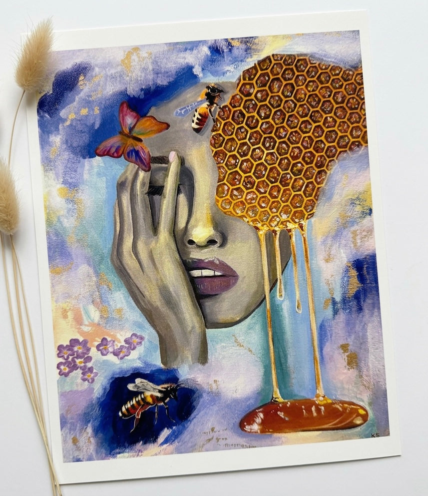 A print of a portrait with honeycomb, a butterfly and a bee.