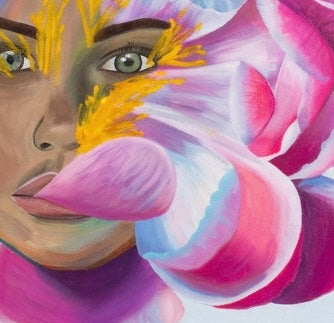 A close up of a woman’s face merged with a magenta pink flower