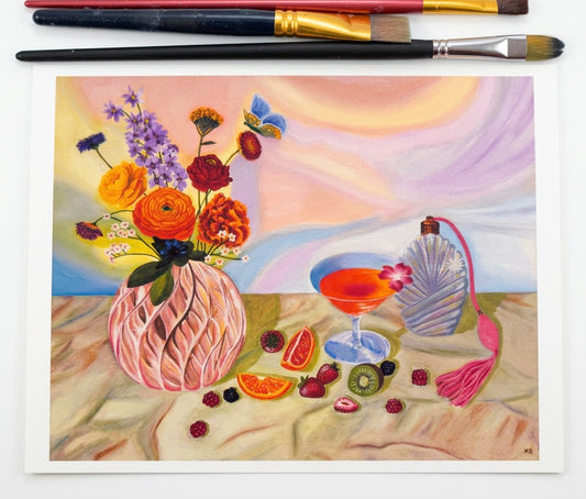A print featuring a perfume bottle, martini, vase of flowers, fruit and a butterfly 