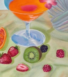 An up close of a painted martini and fruit against a sage green background