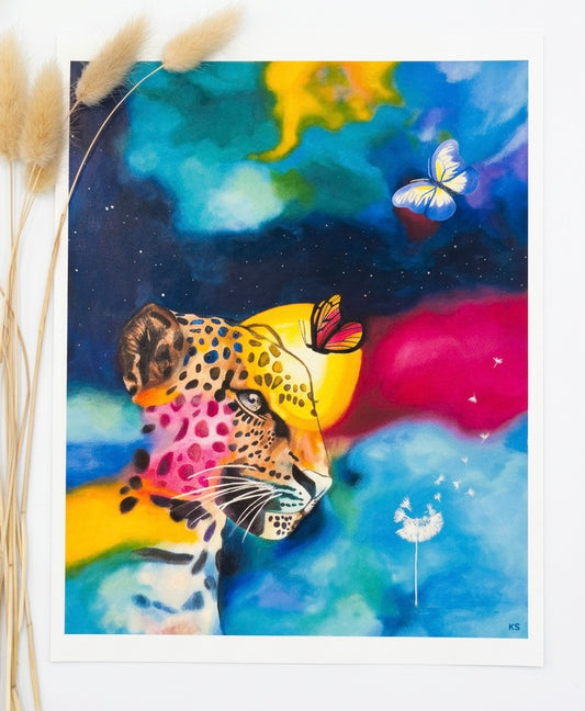 A print of a cheetah in a galaxy with a dandelion and a butterfly