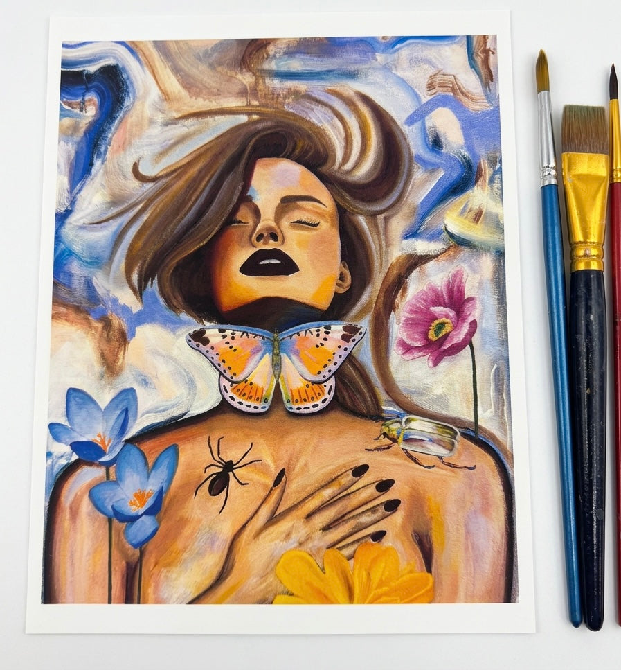 A picture of a print featuring a woman with her eyes closed surrounded by flowers and animals including a spider, beetle, and butterfly with an abstract background