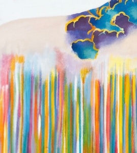 A close up of a painting featuring rainbow clouds and swatches of paint. 