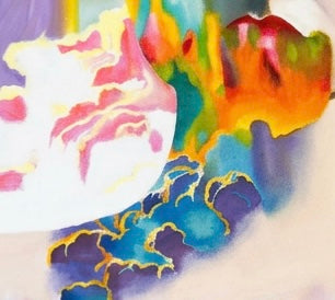 A close up of painted rainbow clouds
