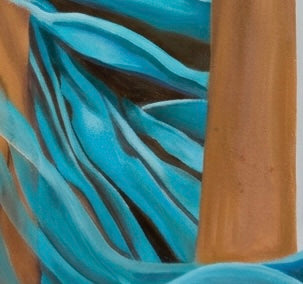 A close up of painted transparent blue fabric