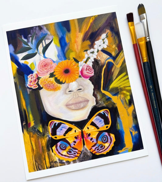 A print of a portrait with abstract swatches of paint, a butterfly and flowers