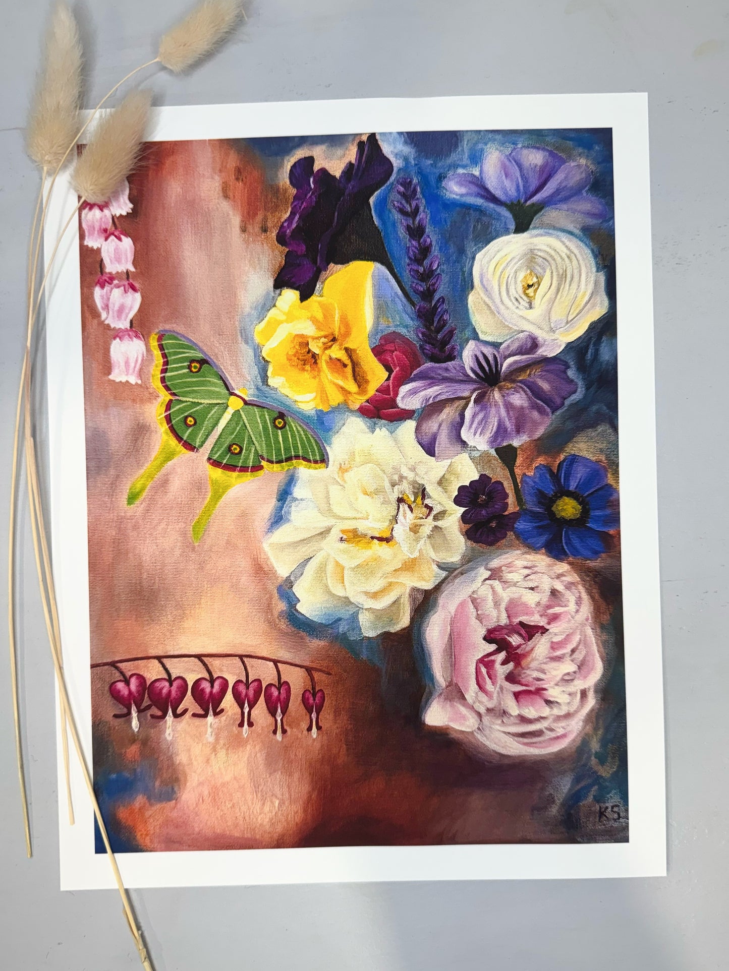 Colorful art print of flowers and a butterfly on a white background