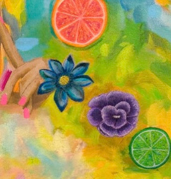 A close up of painted citrus fruit and flowers