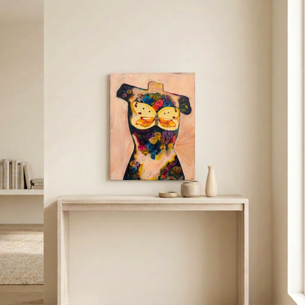 Torso Volume 4, a floral torso painting with a yellow butterfly on peach, displayed unframed above a pale wood console in a neutral room.