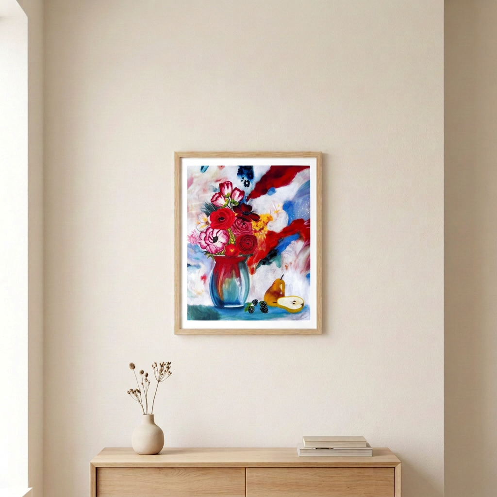 Fresh and Glowy floral still-life print in a light wood frame with a white border above a pale wood console in a warm neutral room.
