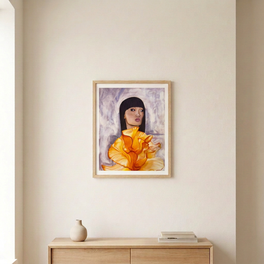It's Couture Print in a slim light wood frame with its white border, hung above a pale wood console in a warm neutral room.